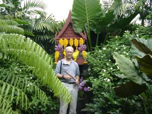My dad, next to a shrine at Jim Thompson's house